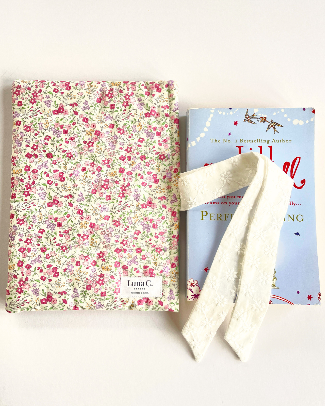 Pink Ditsy Floral Book Sleeve with White Broderie Anglaise Ribbon Tie