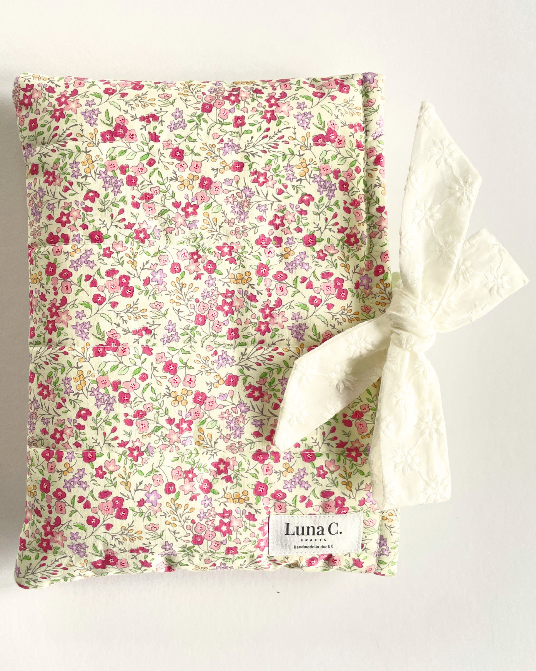 Pink Ditsy Floral Book Sleeve with White Broderie Anglaise Ribbon Tie