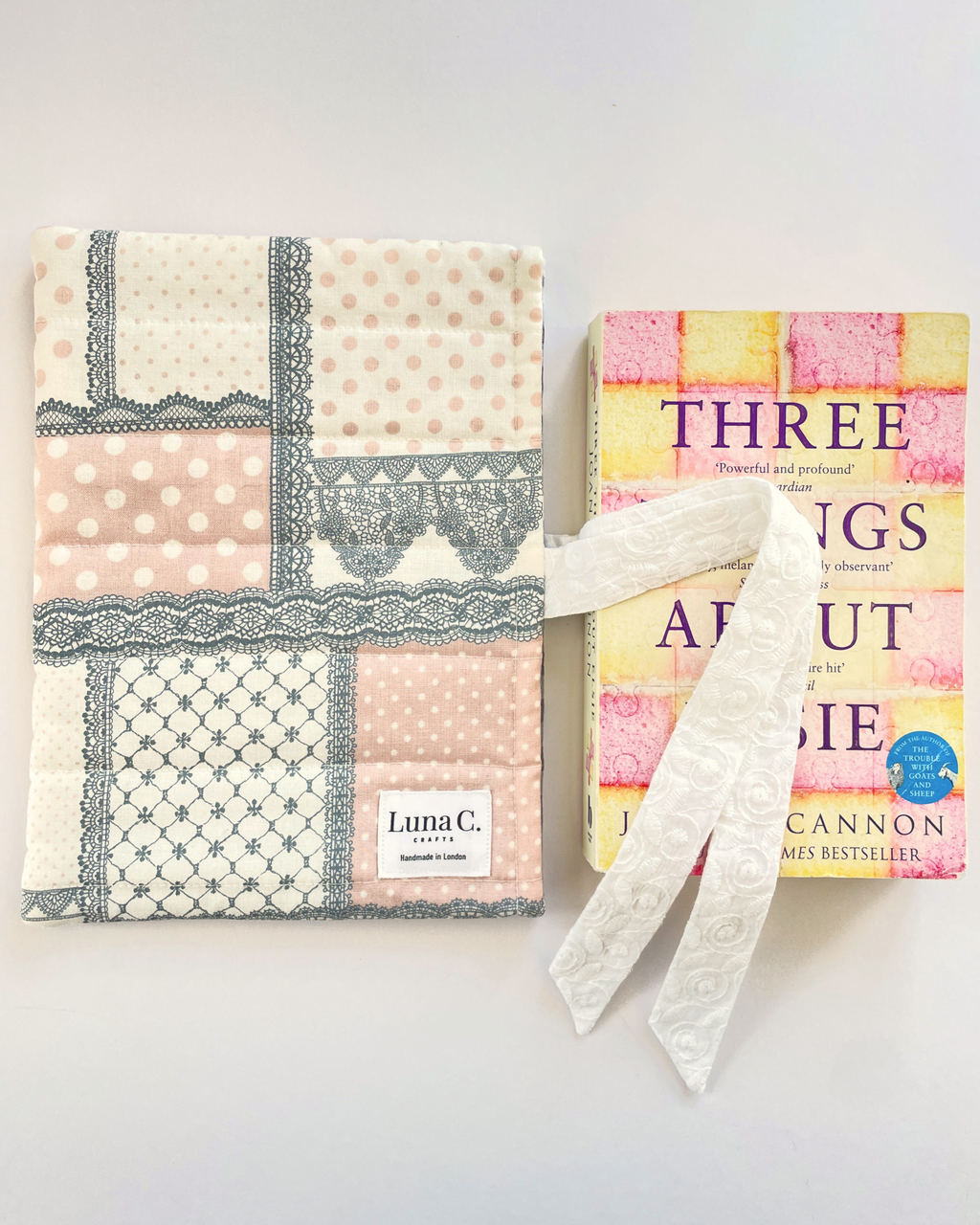 Pink and Grey Patchwork Book Sleeve with White Broderie Anglaise Ribbon Tie