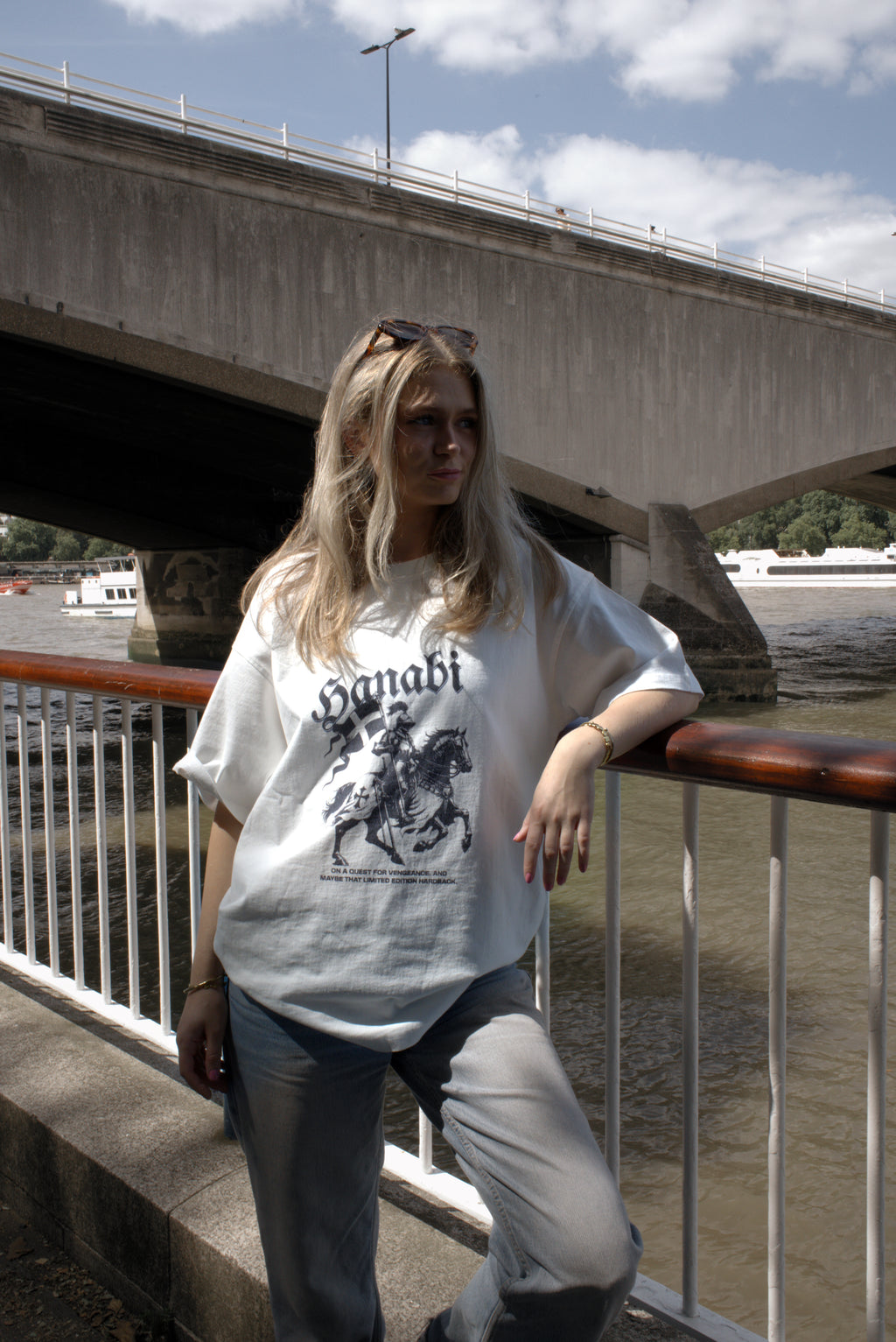 Woman wearing a Hanabi bookish graphic t-shirt