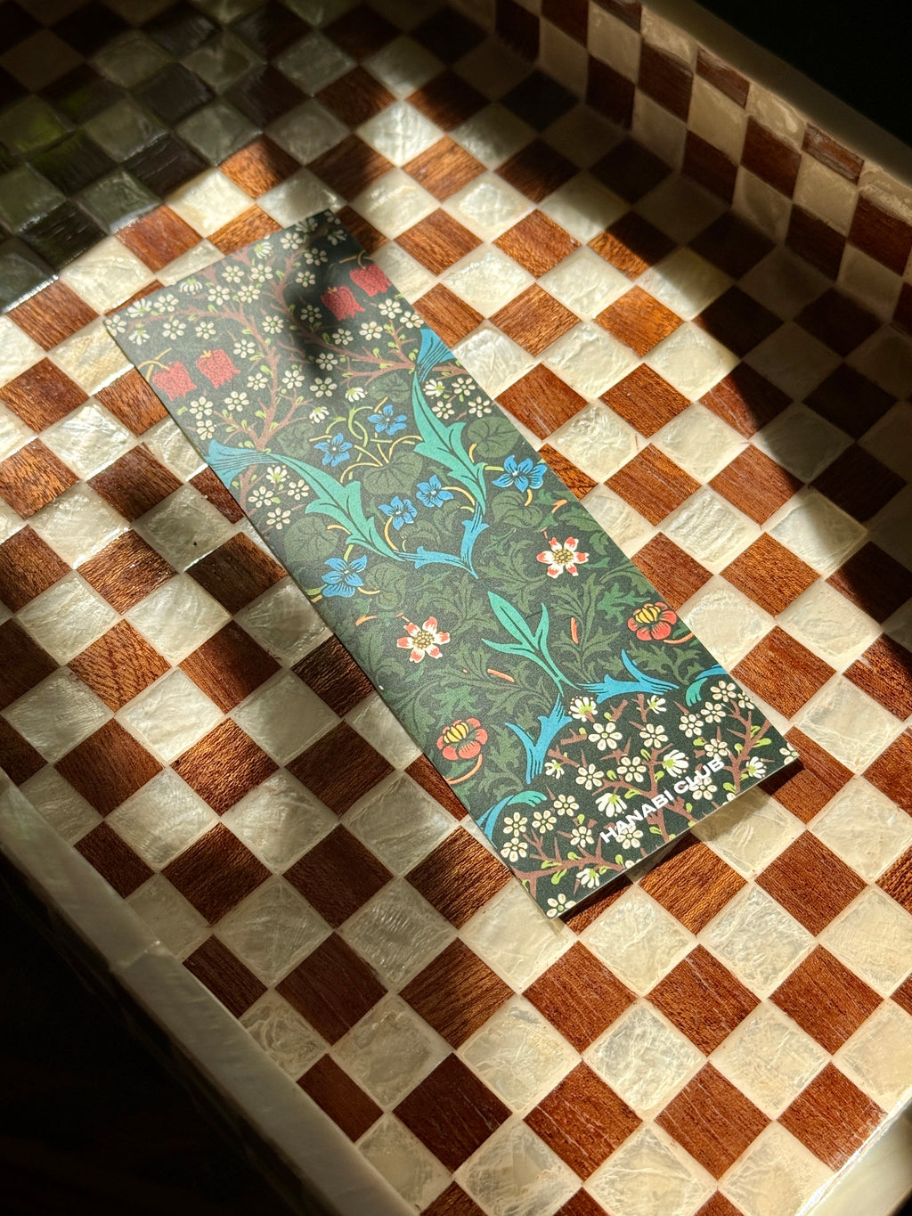 Window Seat bookmark with dark floral botanical illustration