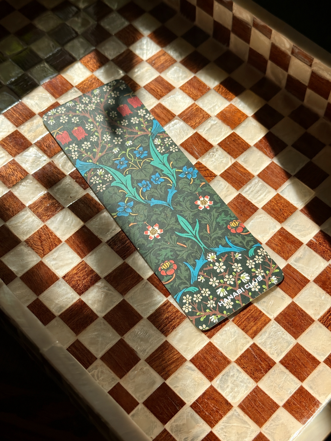Window Seat bookmark with dark floral botanical illustration